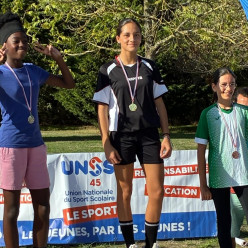 ROMANE: Championne de district CROSS